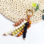 Vintage Boho Wooden Bead Bag Charm Keychain – Handmade Tassel Pendant for Handbags, Backpacks & Car Keys